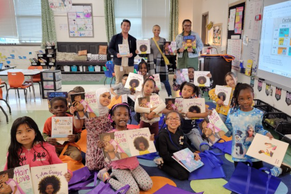 Figures 2 and 3: Students at Des Moines elementary schools received two books, each written by a Black or African American author. BEN visited the schools to deliver the books and read with the students.