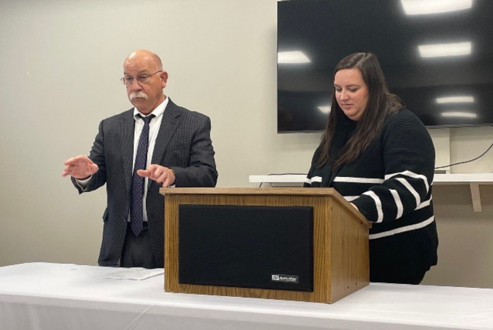 Figure 1: Pat Jonas, CEO of CPRF, and Kylie Mergen, Community Investment Officer and Director of Housing and Community Development, present to bank employees.