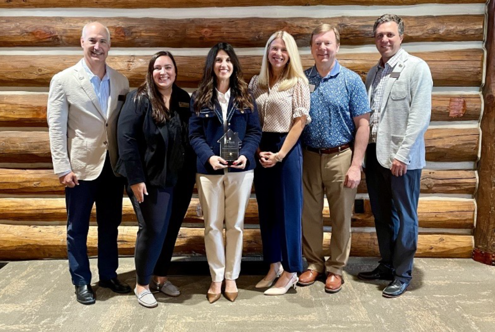 FNBO accepts Regional Housing Champion award at FHLBank Topeka's regional meeting at Wilderness Ridge in Lincoln, Nebraska, in August 2024. Pictured (left to right): Jeff Kuzbel, FHLBank President and CEO, Kylie Mergen, FHLBank Community Investment Officer, Christina Kahler, FNBO Managing Director of Marketing and Philanthropy, Whitney Baker, FNBO Director of Philanthropy and Giving, Barry Lockard, FHLBank Board Chair and President and CEO of Cornhusker Bank, Matt Koupal, FHLBank Chief Legal and Ethics Officer